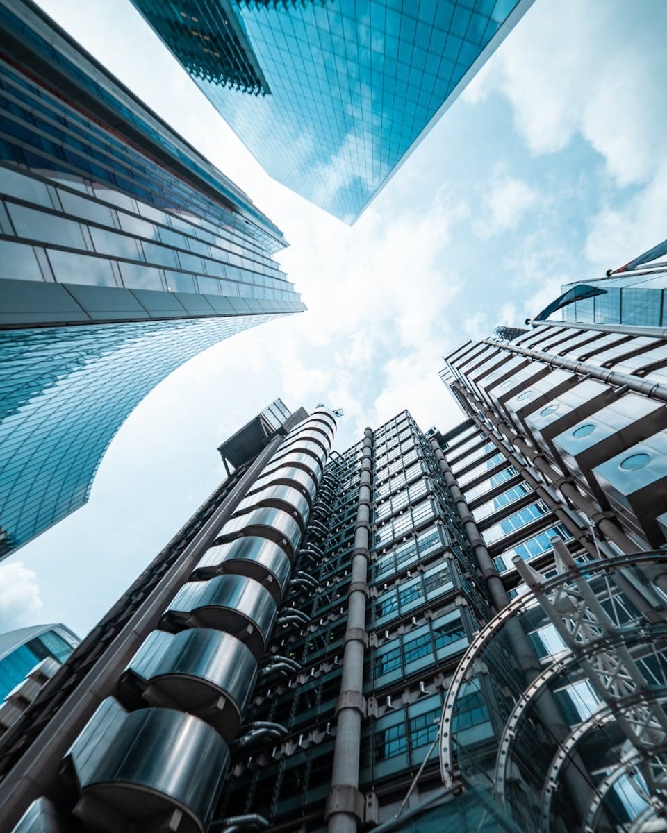 Upward view of modern skyscrapers in London, the centre of financial services consulting Europe